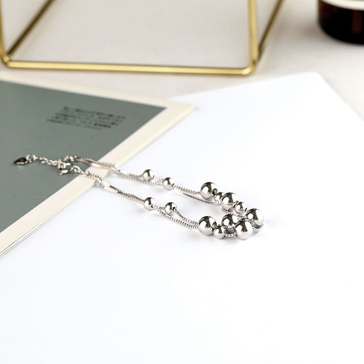 Pulsera de perlas de la suerte