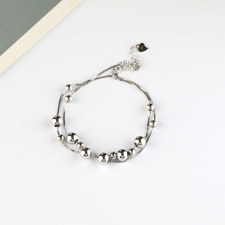 Pulsera de perlas de la suerte