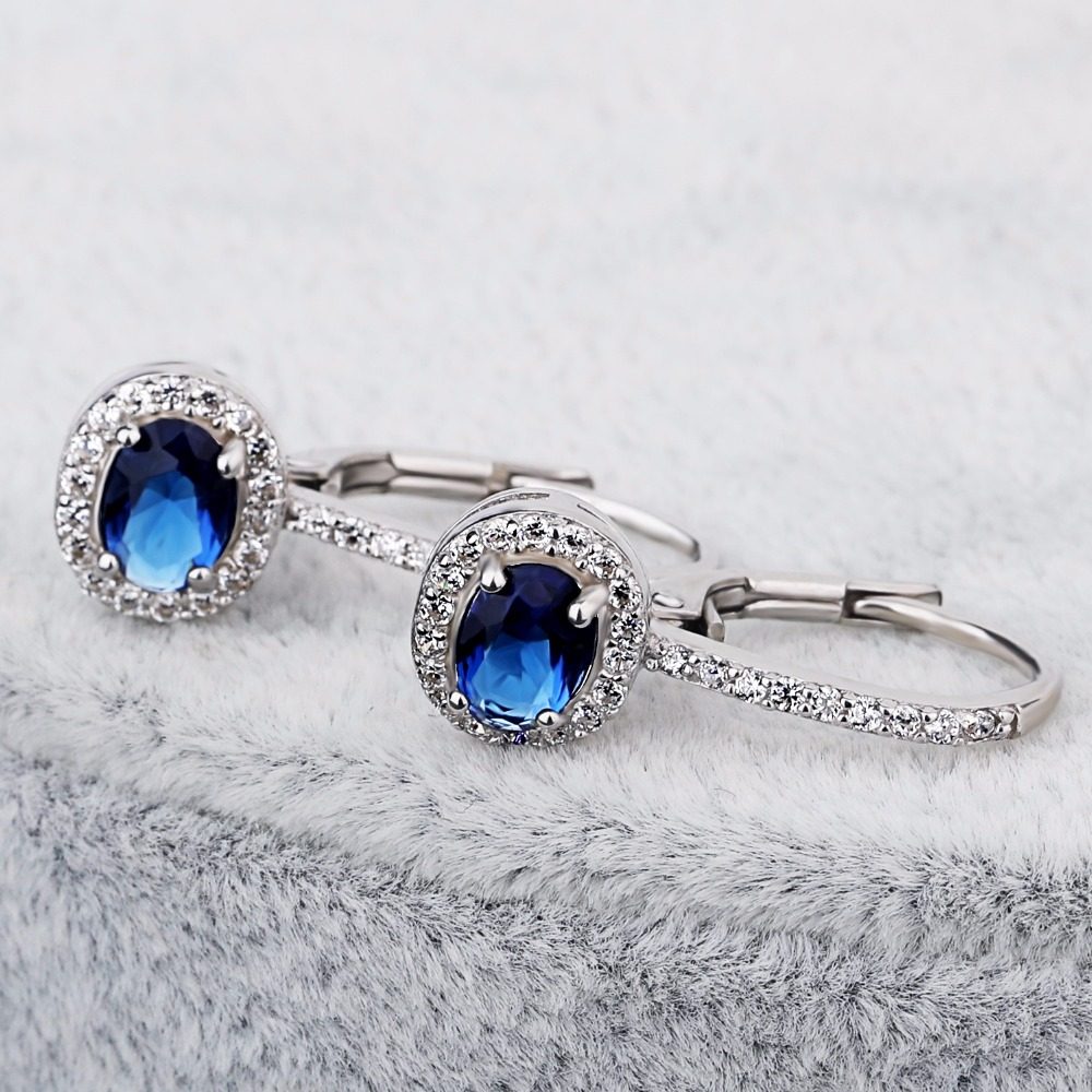 Pendientes de clip con diseño de piedras preciosas azules