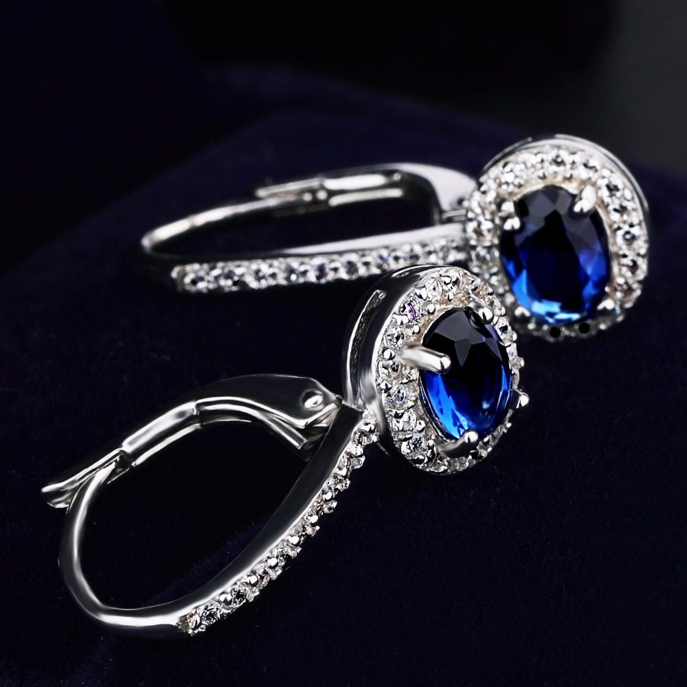 Pendientes de clip con diseño de piedras preciosas azules