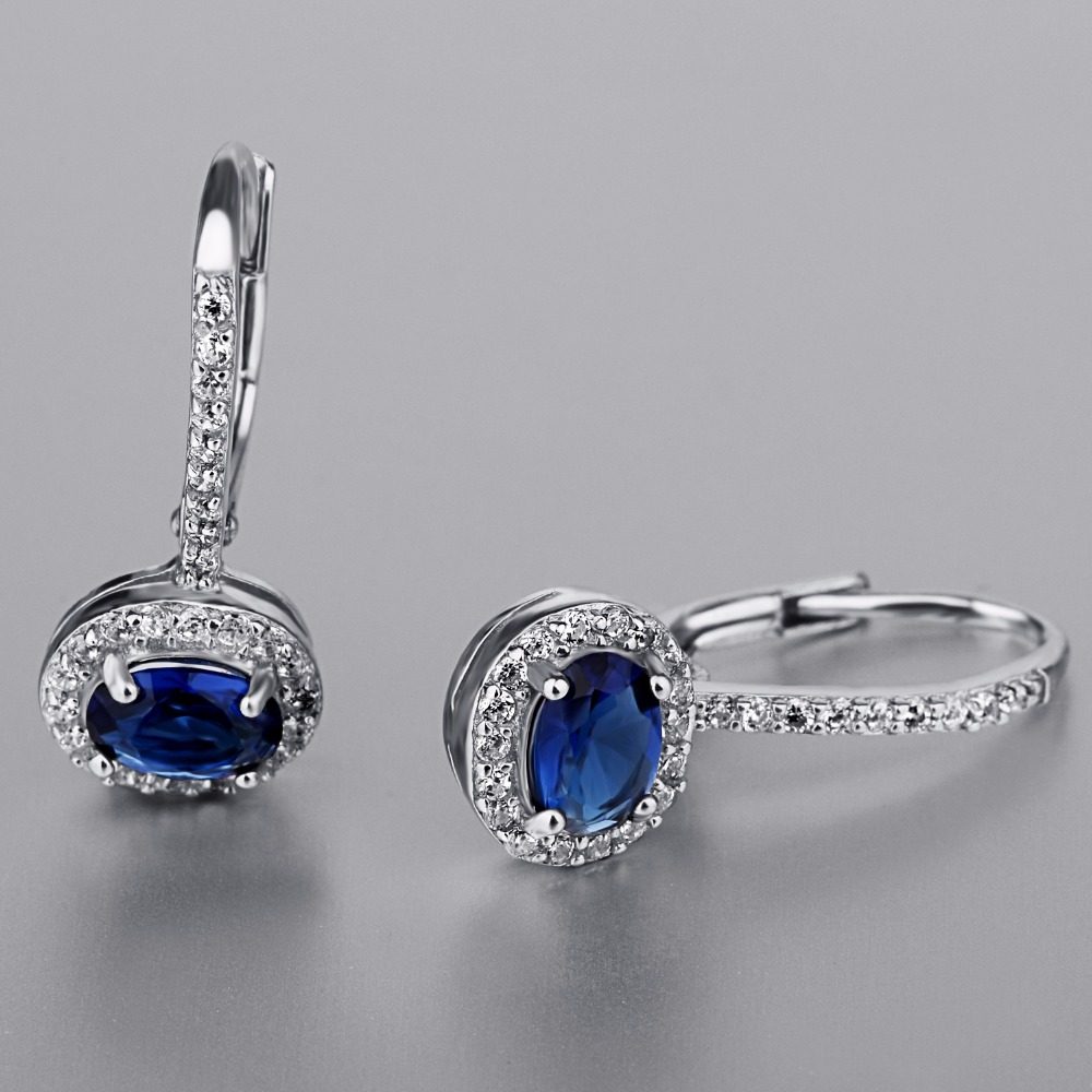 Pendientes de clip con diseño de piedras preciosas azules