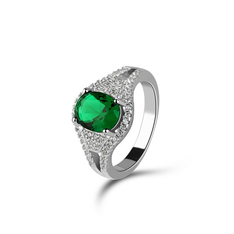Anillo de plata de ley de Mascota, con piedra verde ovalada y circonita blanca